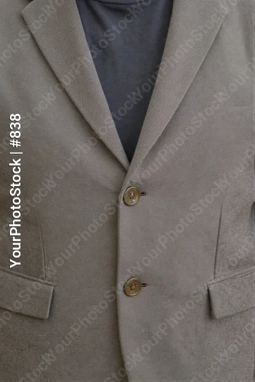 Close-up of Beige Blazer with Gold Buttons clothing