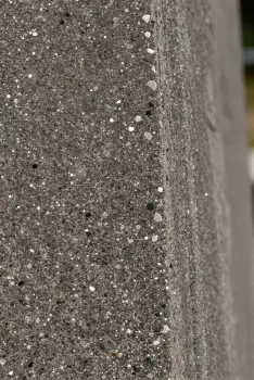 Dark Grey Concrete Wall with White Speckles texture