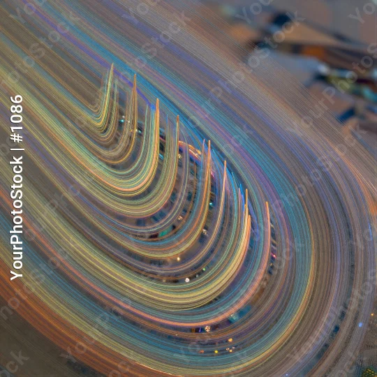 City Street at Night with Moving Cars and Vibrant Lines