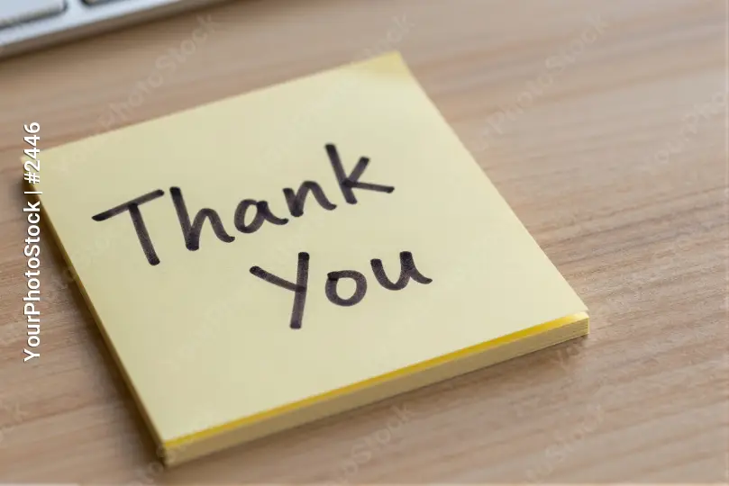 Thank You Sticky Note on Wood with Keyboard wooden surface
