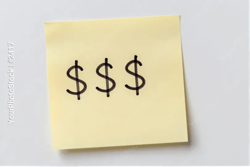 Crumpled Yellow Sticky Note with Dollar Signs