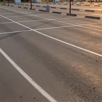 Empty Parking Lot with White Lines lanes dirt