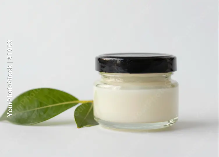 Creamy Body Butter in Glass Jar with Green Leaf