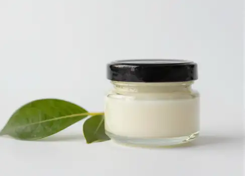 Creamy Body Butter in Glass Jar with Green Leaf