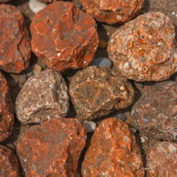 Close-up of Small Rocks with Reddish-Brown Color and Orange Speckles