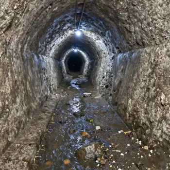 Tunnel Interior: Rock Walks with Small River rock formations