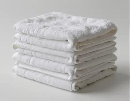 Neatly Folded White Towels Stack textured tidy hotel