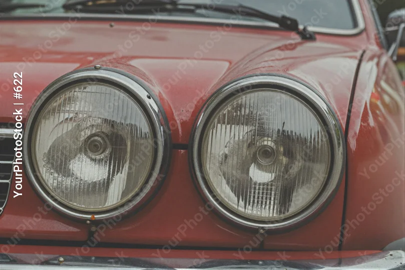 Vintage Red Car Close-Up round headlight grille