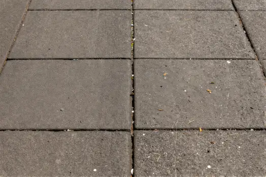 Close-up of Gray Square Pavement Tiles grid overlaps