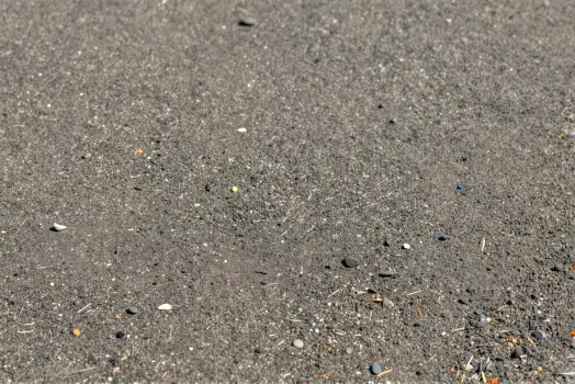 Close-up of Rough Asphalt Surface with Specks texture