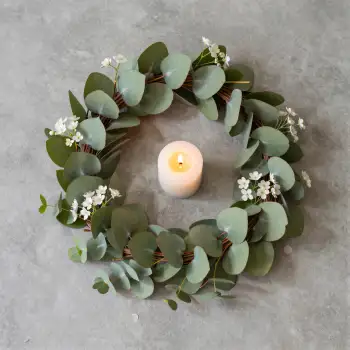 Eucalyptus Wreath with Candle on Gray Surface