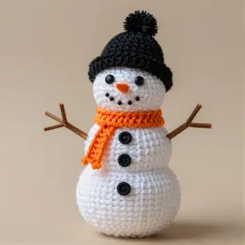 crocheted snowman with hat and scarves yarn handmade