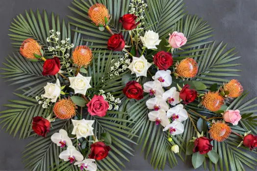 Circular Flower Arrangement with Roses and Proteas