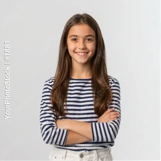 Happy Young Girl Smiling with Arms Crossed portrait